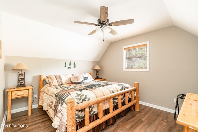 bedroom with ceiling fan, dark wood-type flooring, and lofted ceiling