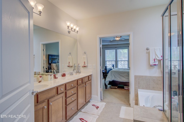 bathroom featuring vanity, tile patterned flooring, ceiling fan, and separate shower and tub