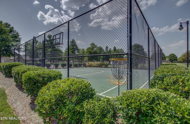 view of sport court featuring basketball court