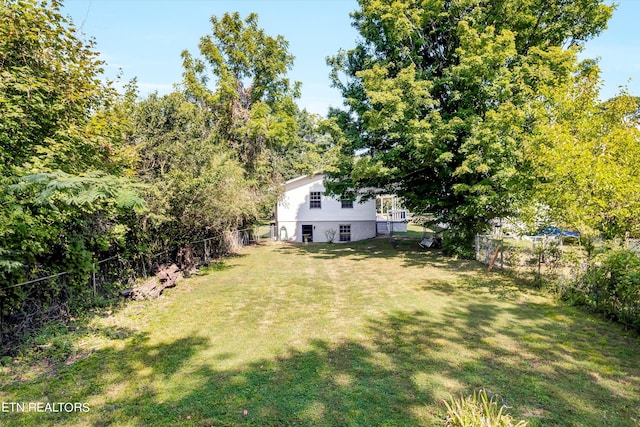 view of yard with fence