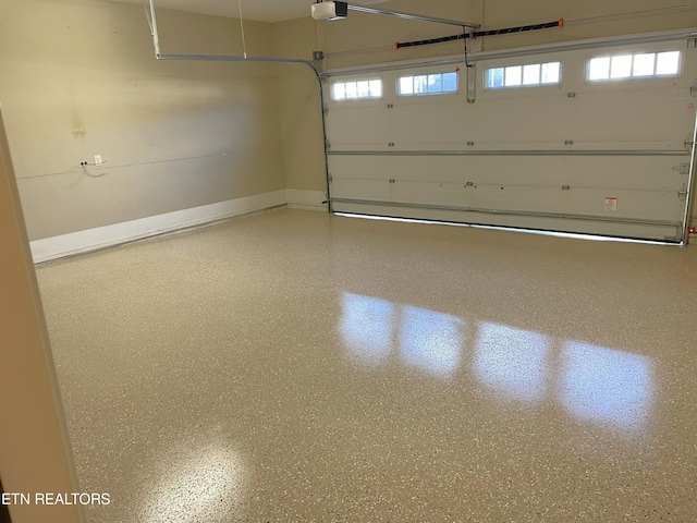 garage with baseboards