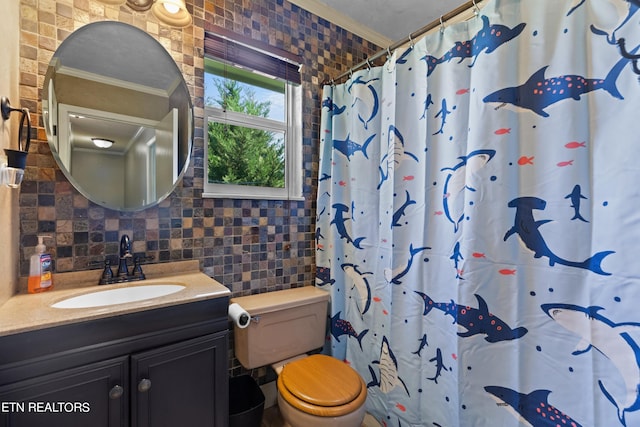 bathroom with toilet, vanity, curtained shower, tile walls, and tasteful backsplash