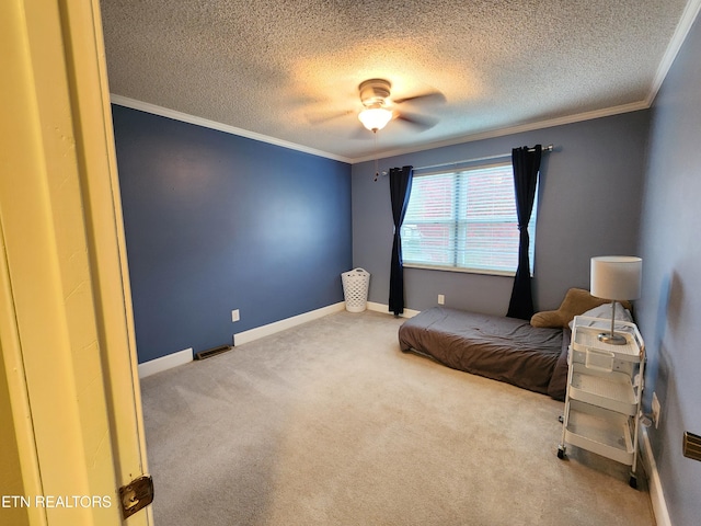 sitting room featuring crown molding, carpet floors, a textured ceiling, and ceiling fan