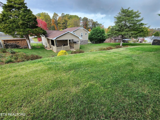 view of yard featuring a porch