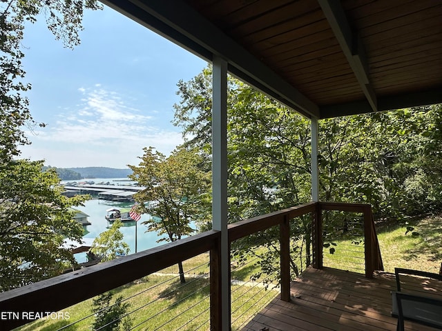 deck featuring a water view