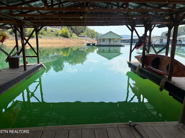 dock area featuring a water view