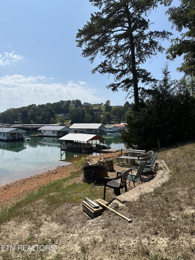 view of dock with a water view