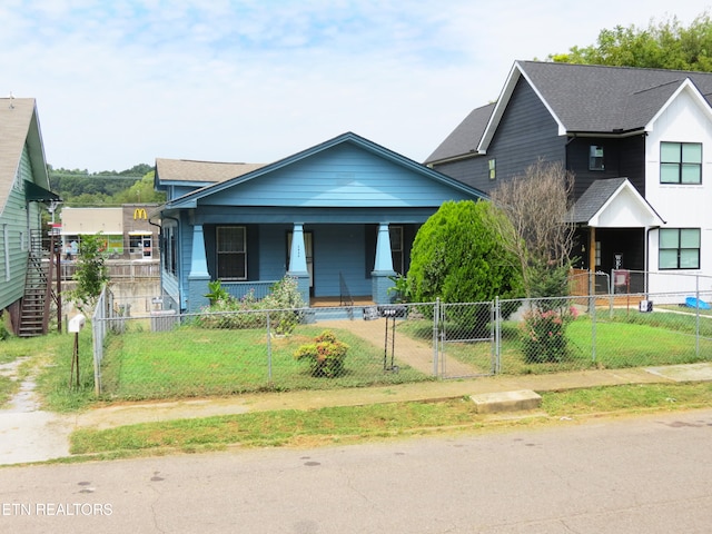 view of front of property featuring covered porch