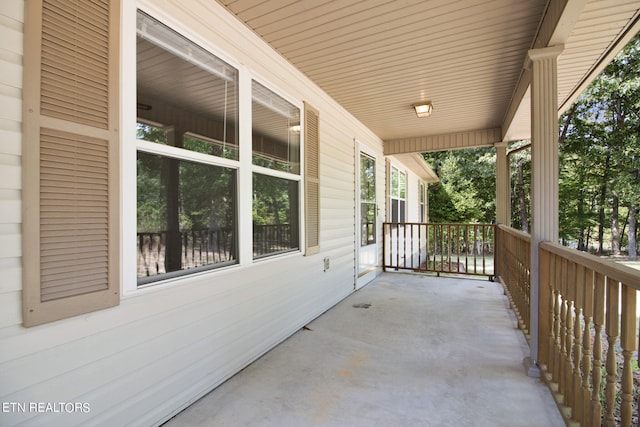 view of patio featuring a porch