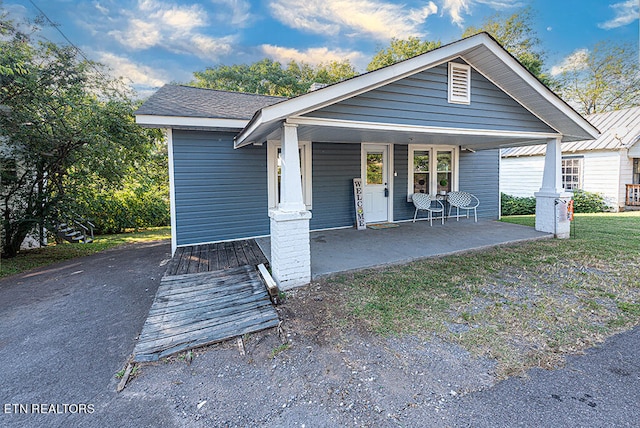 view of front of house featuring covered porch