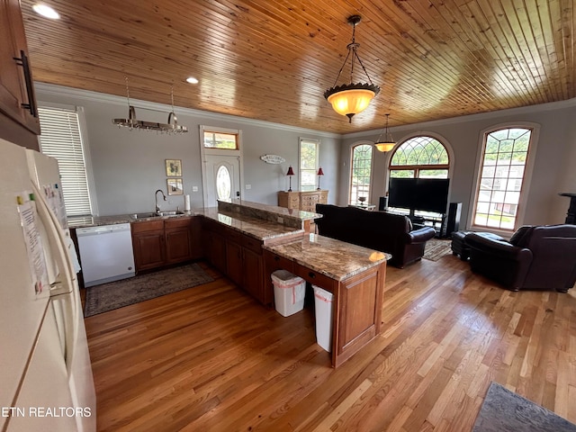 kitchen featuring white appliances, wood ceiling, hanging light fixtures, kitchen peninsula, and hardwood / wood-style flooring