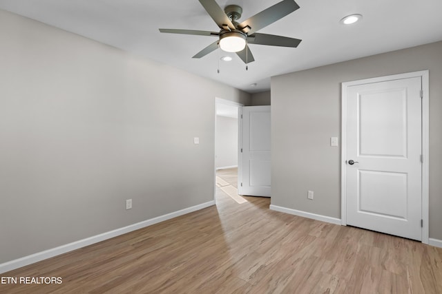 unfurnished bedroom with ceiling fan, light wood-style floors, recessed lighting, and baseboards