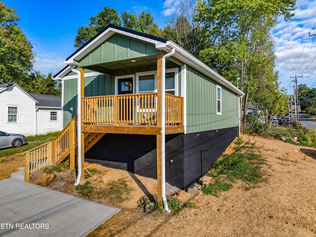 view of front of property featuring a porch and board and batten siding