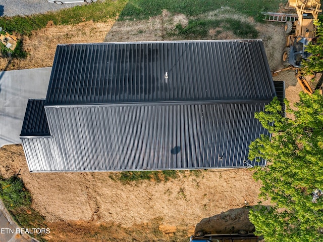 exterior details featuring metal roof