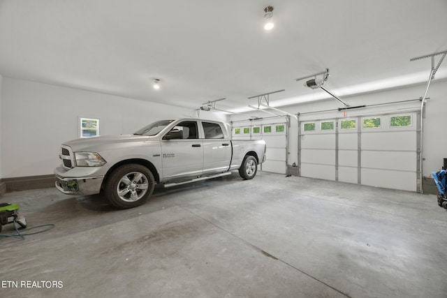 garage featuring a garage door opener