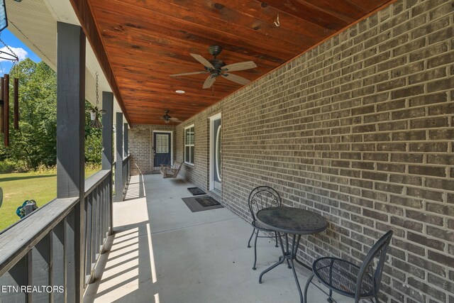 view of patio / terrace featuring ceiling fan