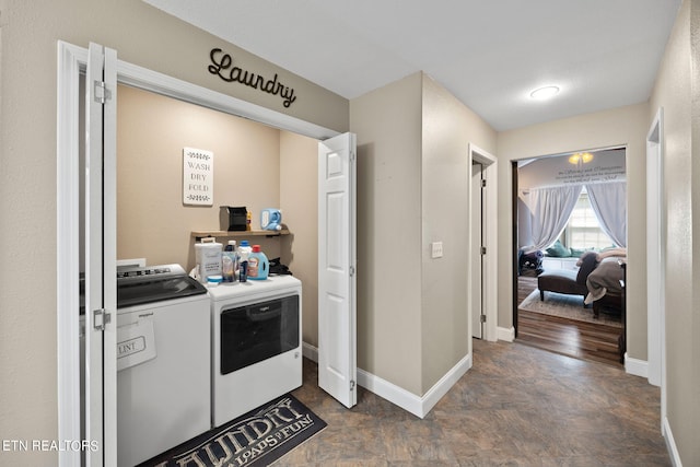 washroom featuring independent washer and dryer