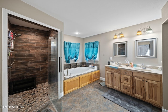 bathroom featuring plus walk in shower and vanity