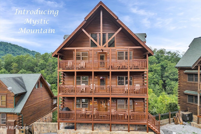 log home with a balcony