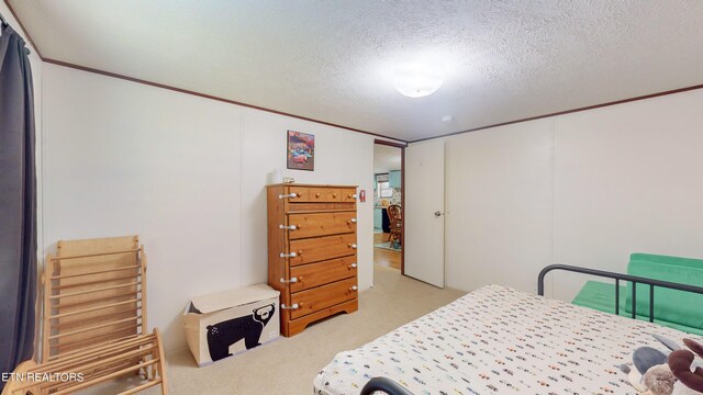 bedroom featuring a textured ceiling