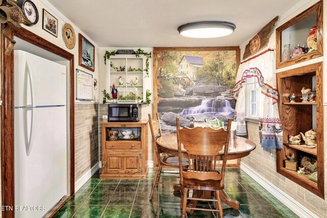 view of tiled dining space