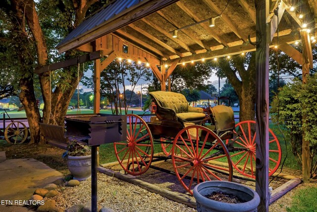 patio terrace at dusk with a gazebo