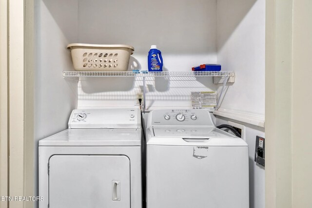 washroom featuring independent washer and dryer