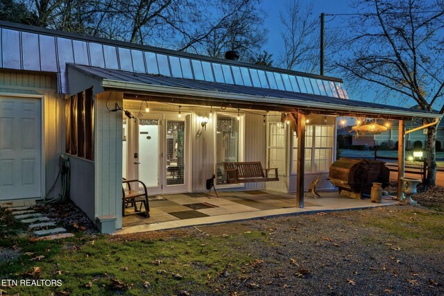 rear view of property with a patio