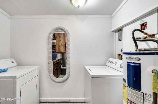 laundry room featuring independent washer and dryer and water heater