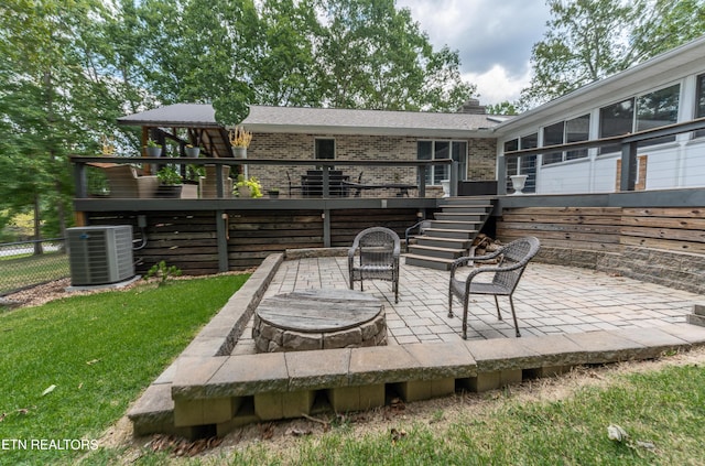 view of patio / terrace featuring central air condition unit and a deck