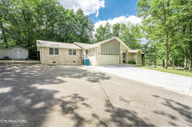 single story home featuring a garage