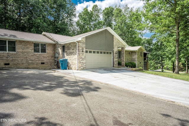 view of property exterior featuring a garage