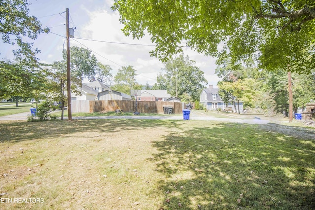 view of yard featuring fence