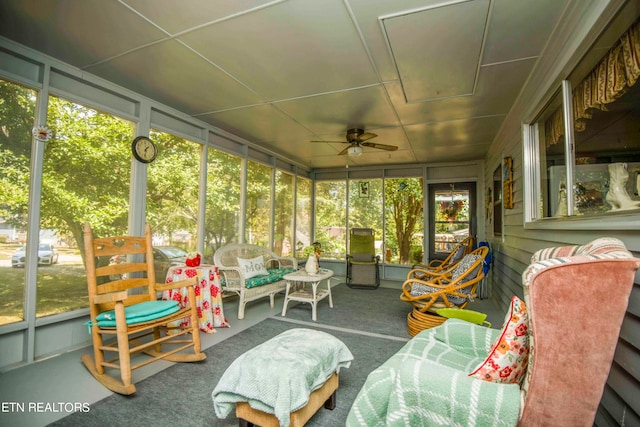 sunroom / solarium featuring a healthy amount of sunlight