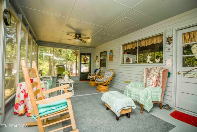 sunroom / solarium with ceiling fan