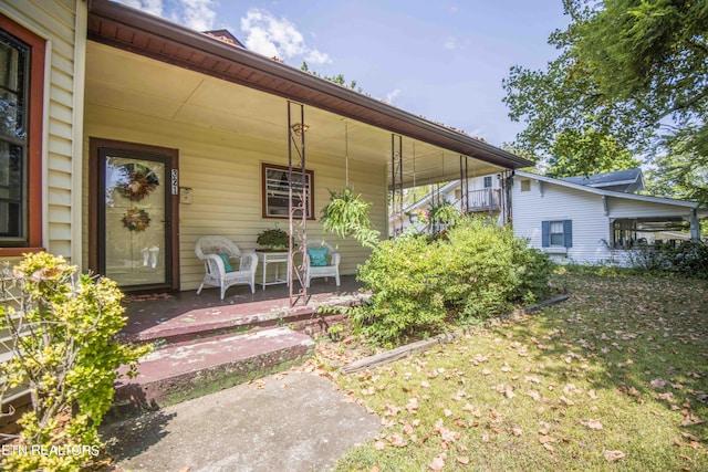 property entrance featuring covered porch