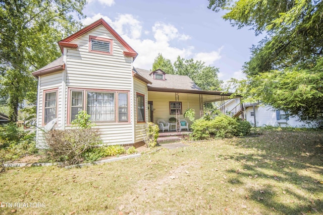 view of front of house with a front lawn