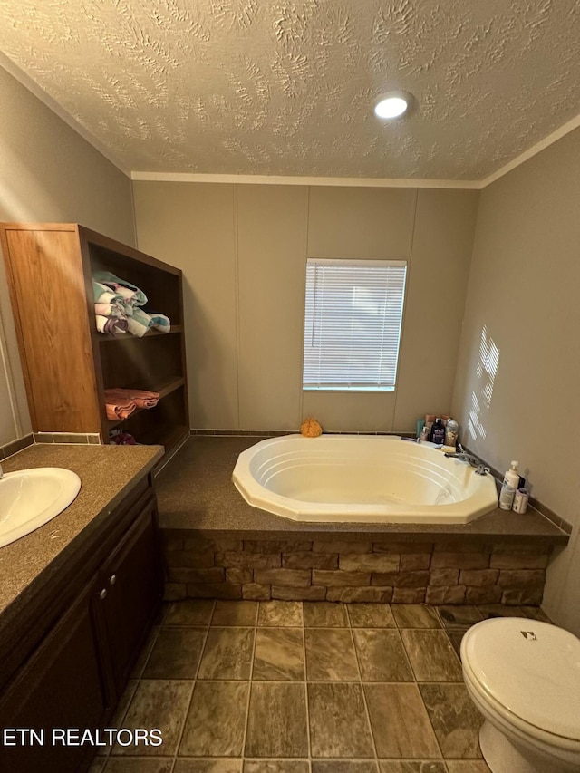 full bath featuring toilet, ornamental molding, a textured ceiling, vanity, and a bath