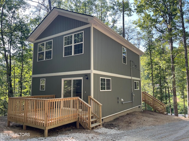 rear view of house with a deck