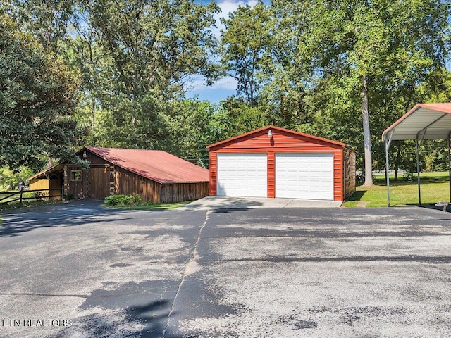 garage featuring a carport