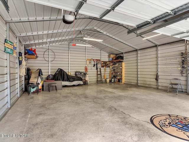 garage featuring a garage door opener