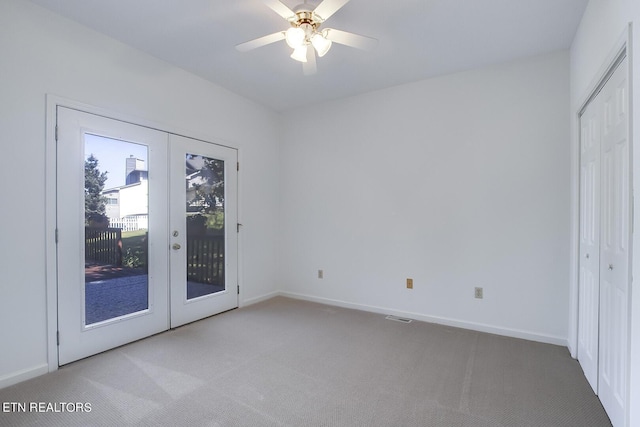 unfurnished bedroom featuring visible vents, baseboards, access to outside, french doors, and carpet floors