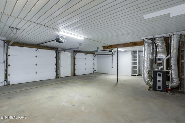 garage with heating unit and a garage door opener