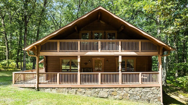 rear view of house with a deck