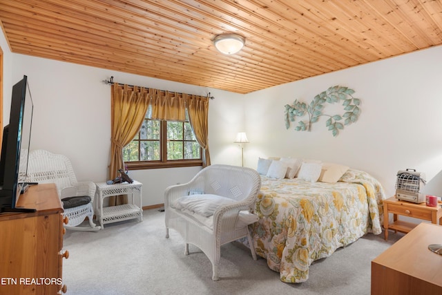 carpeted bedroom featuring wood ceiling