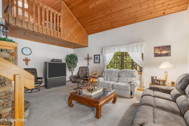 carpeted living room featuring wooden ceiling and high vaulted ceiling