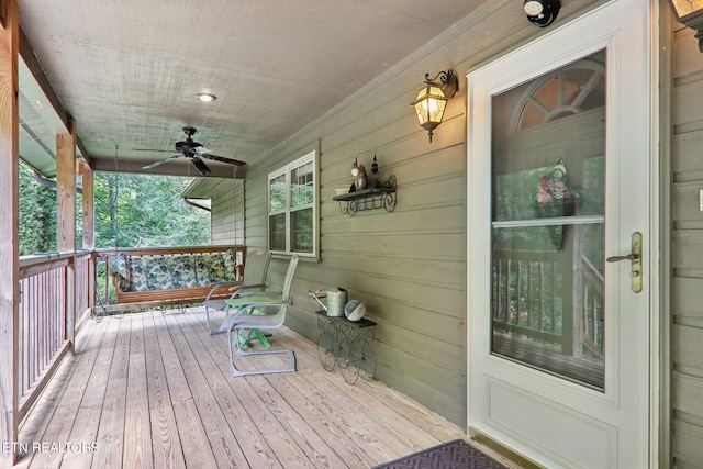 3138 Cool Creek Rd, Sevierville, TN 37862 - wooden deck with a porch and a ceiling fan