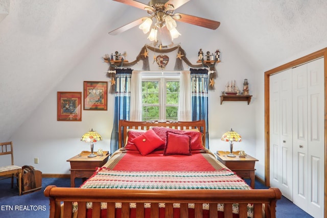 bedroom with lofted ceiling, a closet, and ceiling fan