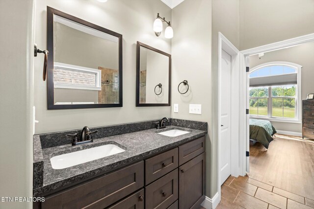 bathroom featuring vanity and hardwood / wood-style flooring