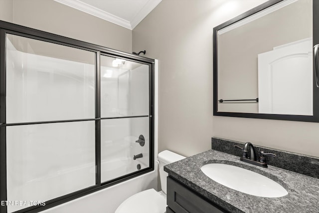 full bathroom with toilet, crown molding, combined bath / shower with glass door, and vanity